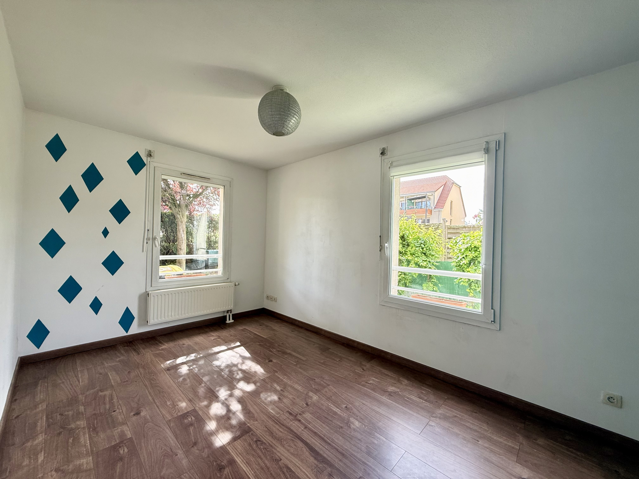 Beau F3 rez-de-jardin garage.